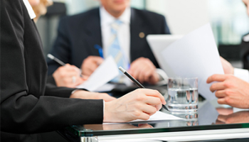 A diverse group of business professionals engaged in discussion